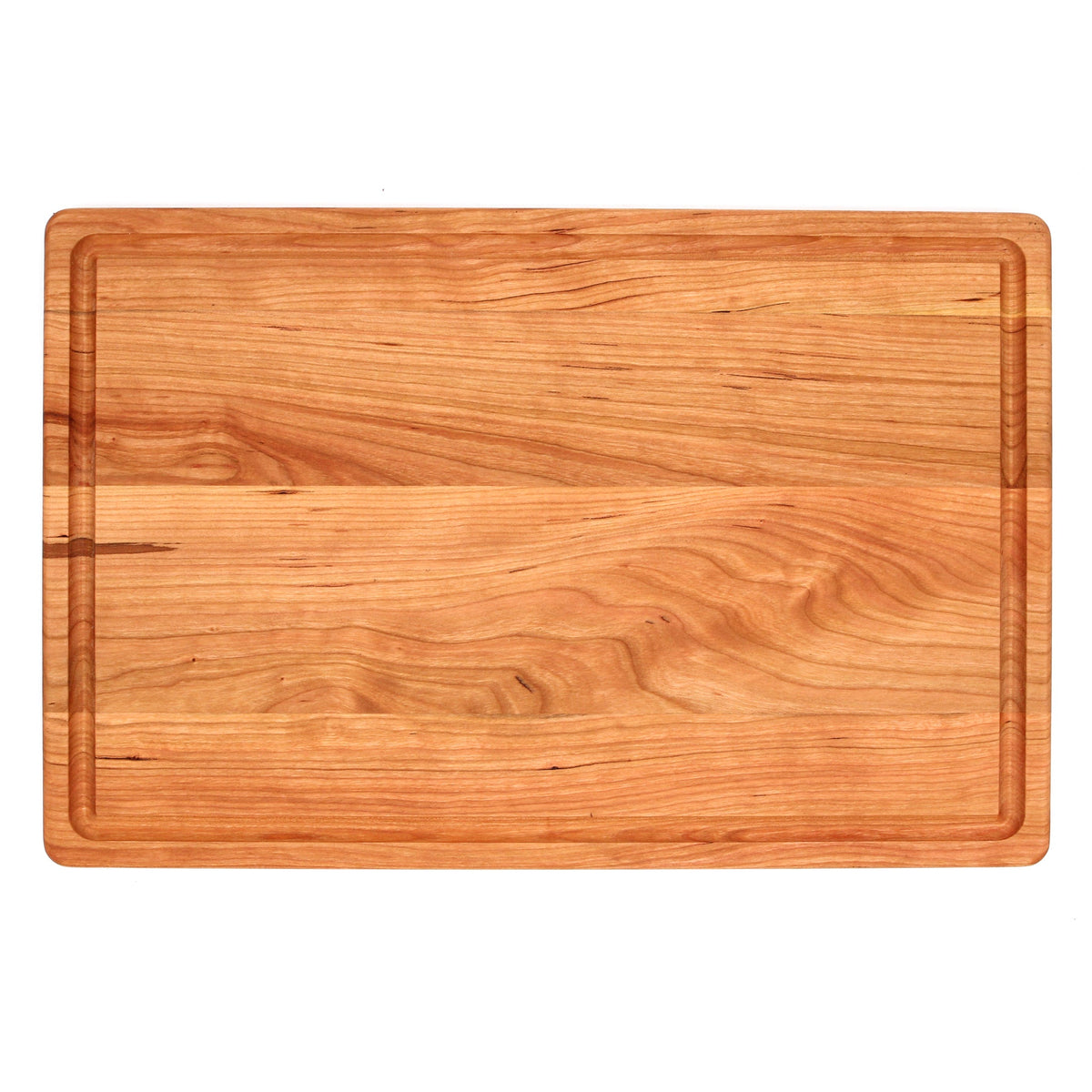 Cherry cutting board with a juice groove, 18 x 12 in, straight overhead view on white