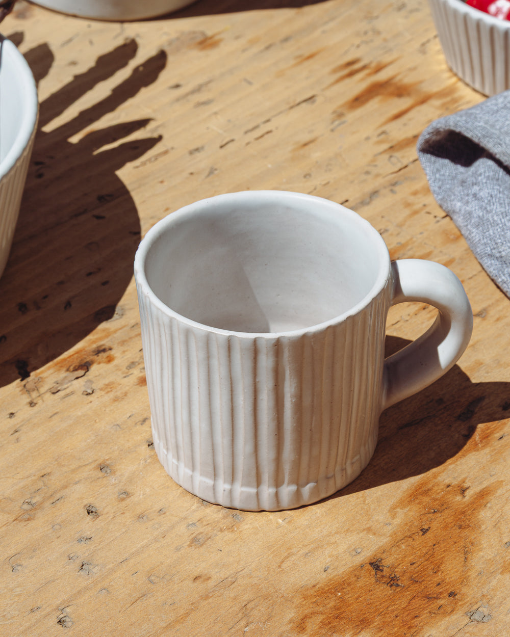 Hand-Carved Matte White Ceramic Mug, detail view