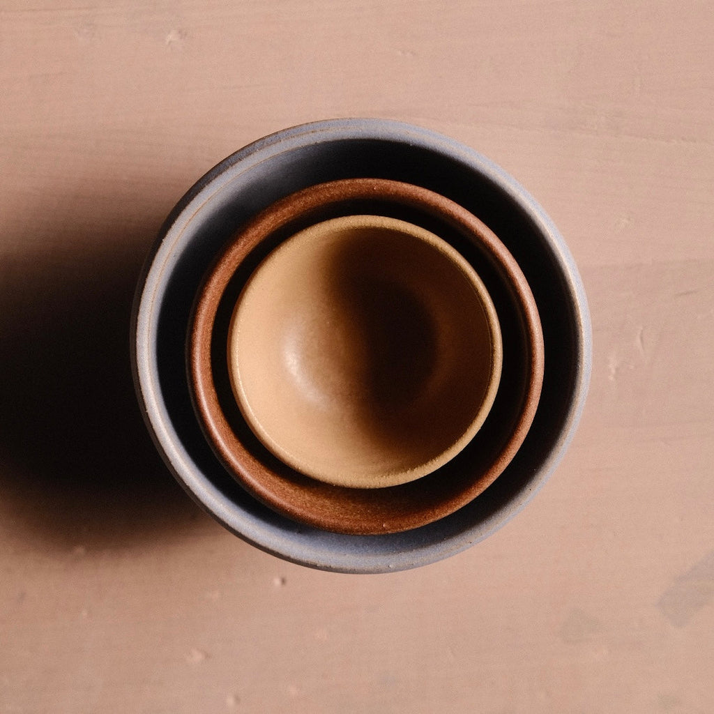 Hand-Thrown Stoneware Side Bowl shown from a second angle against a pale neutral backdrop