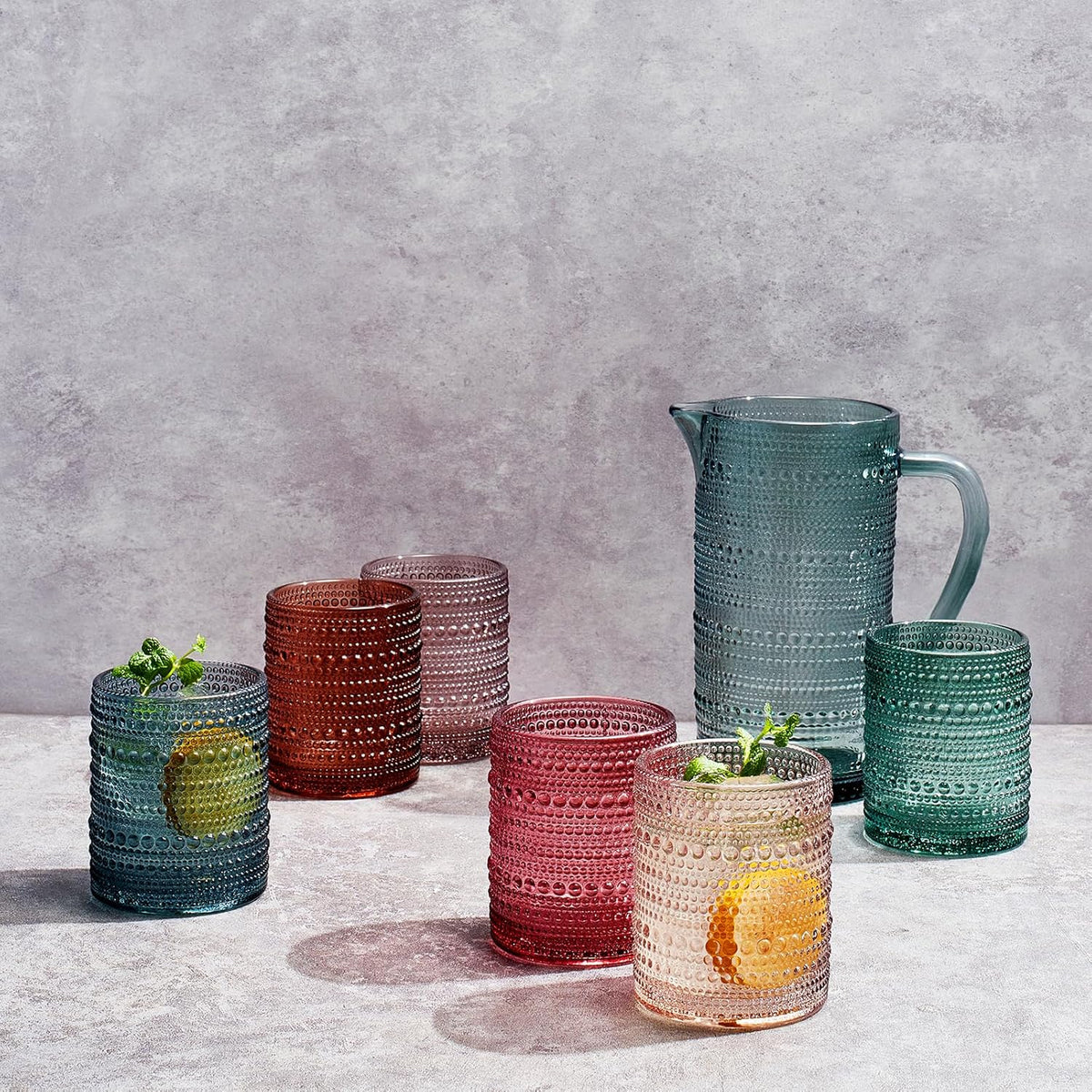 Hobnail Glass Pitcher and Lowball Serving Set shown from a second angle against a pale neutral backdrop