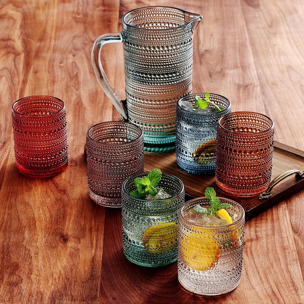 Hobnail Glass Pitcher and Lowball Serving Set styled on a wood table with linen in a modern Southwest room