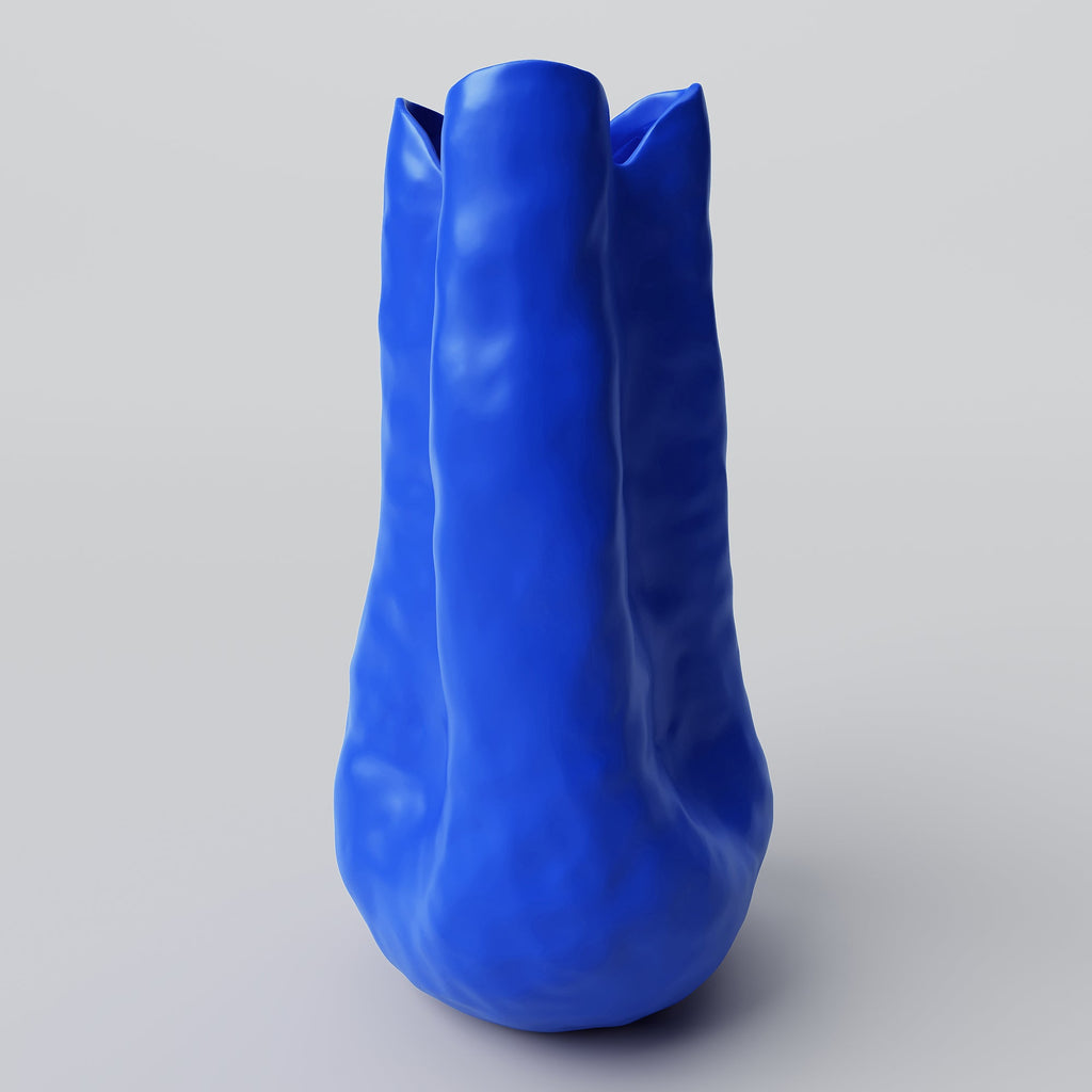 Tall Cobalt Blue Porcelain Vase styled on a wood table with linen in a modern Southwest room
