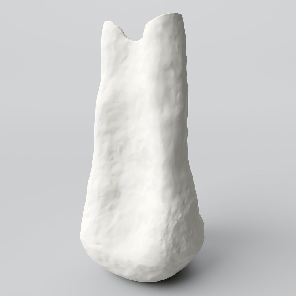 Slender white sculpted porcelain vase in three-quarter view showing its swelling base and notched rim