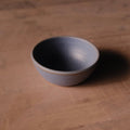 Hand-Thrown Stoneware Side Bowl photographed on a bone white surface in soft natural light