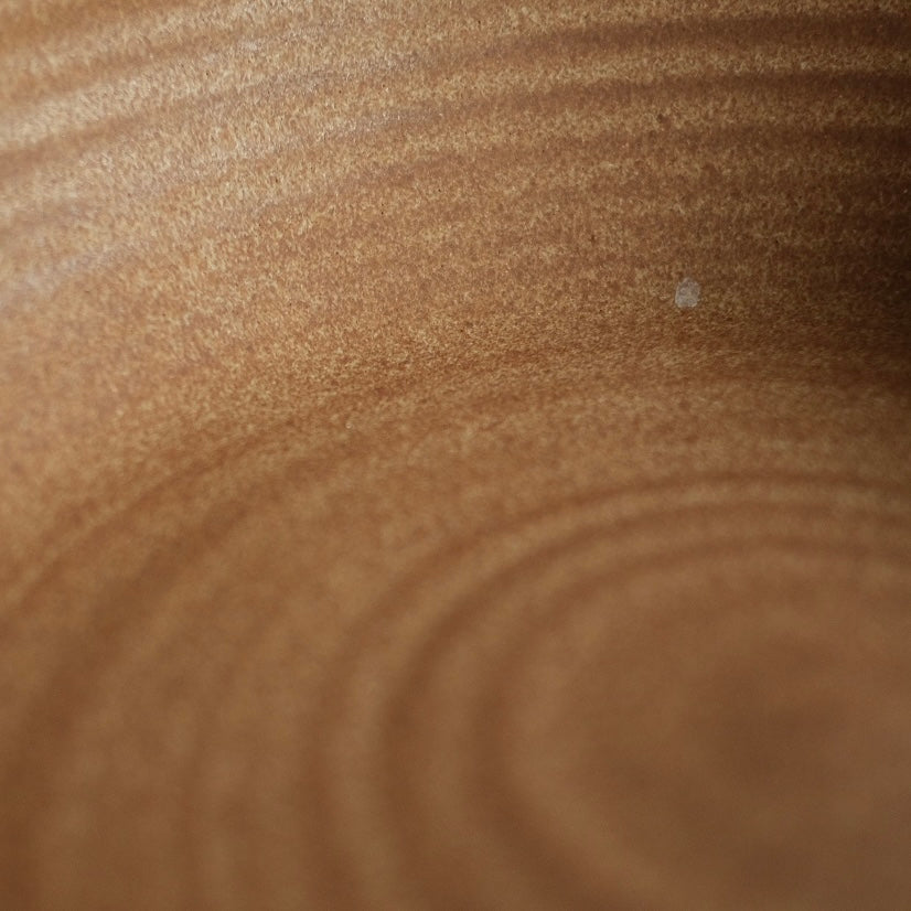 Hand-Thrown Stoneware Side Bowl placed on open kitchen shelving among neutral ceramics