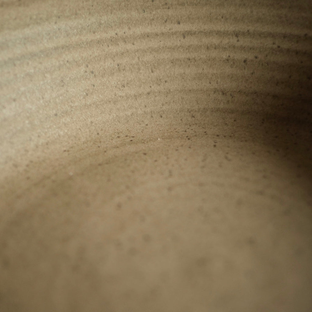Tiny Hand-Thrown Stoneware Bowl shown beside companion pieces from the same maker's line