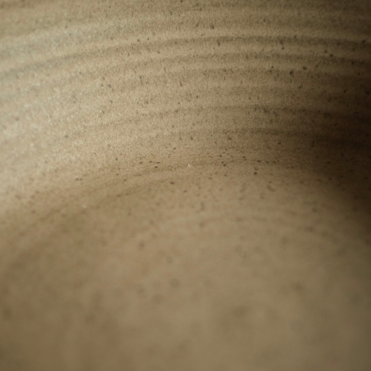 Tiny Hand-Thrown Stoneware Bowl shown beside companion pieces from the same maker's line