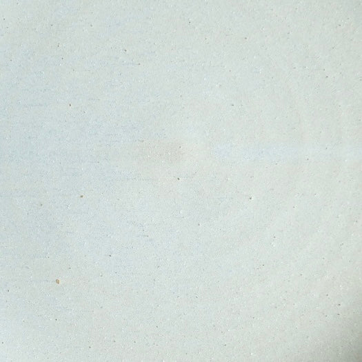 Tiny Hand-Thrown Stoneware Bowl shown at tabletop height against a neutral background