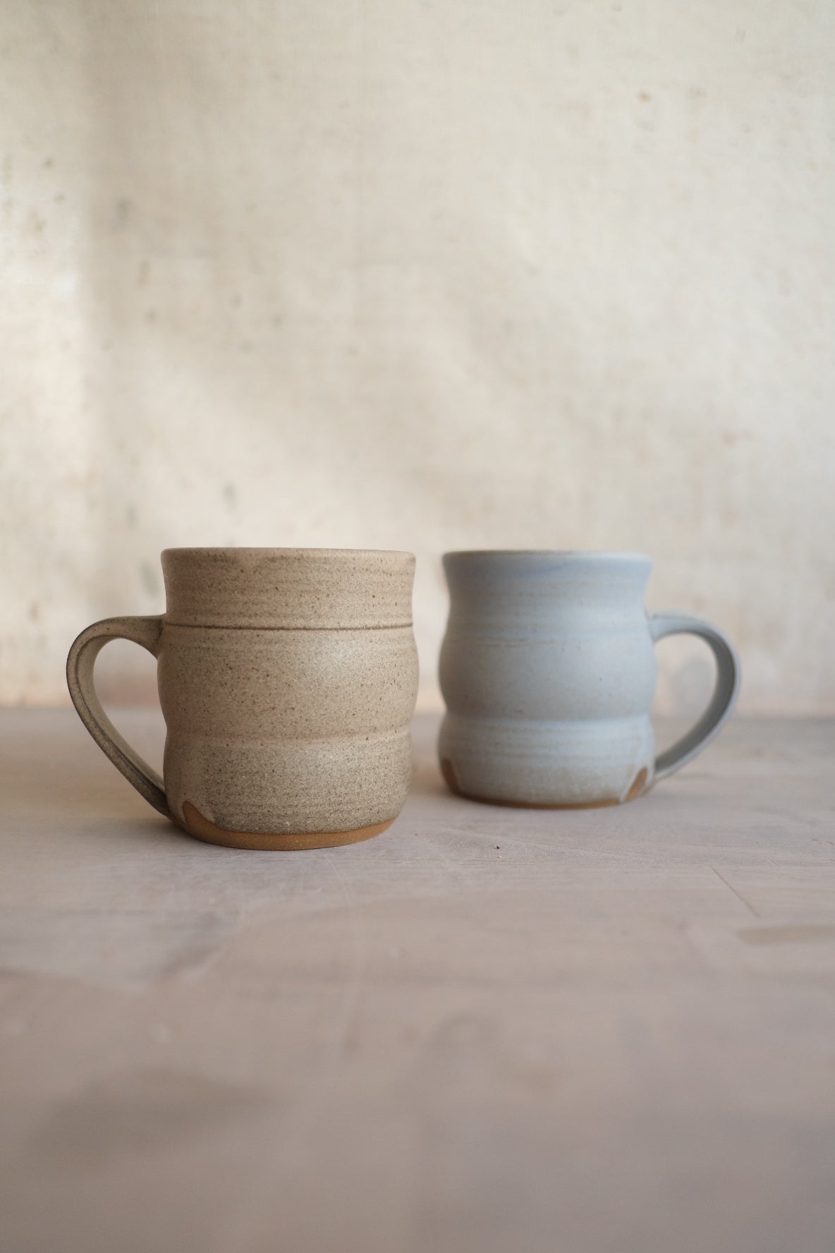 Hand-Thrown Stoneware Wave Mug in a detail view showing surface texture and finish up close