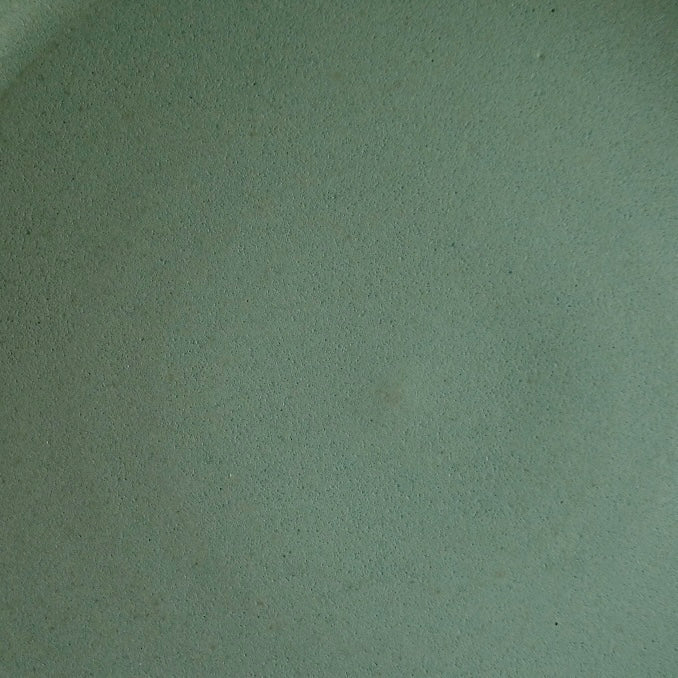 Hand-Thrown Stoneware Side Bowl shown at an angle that catches the light across the surface