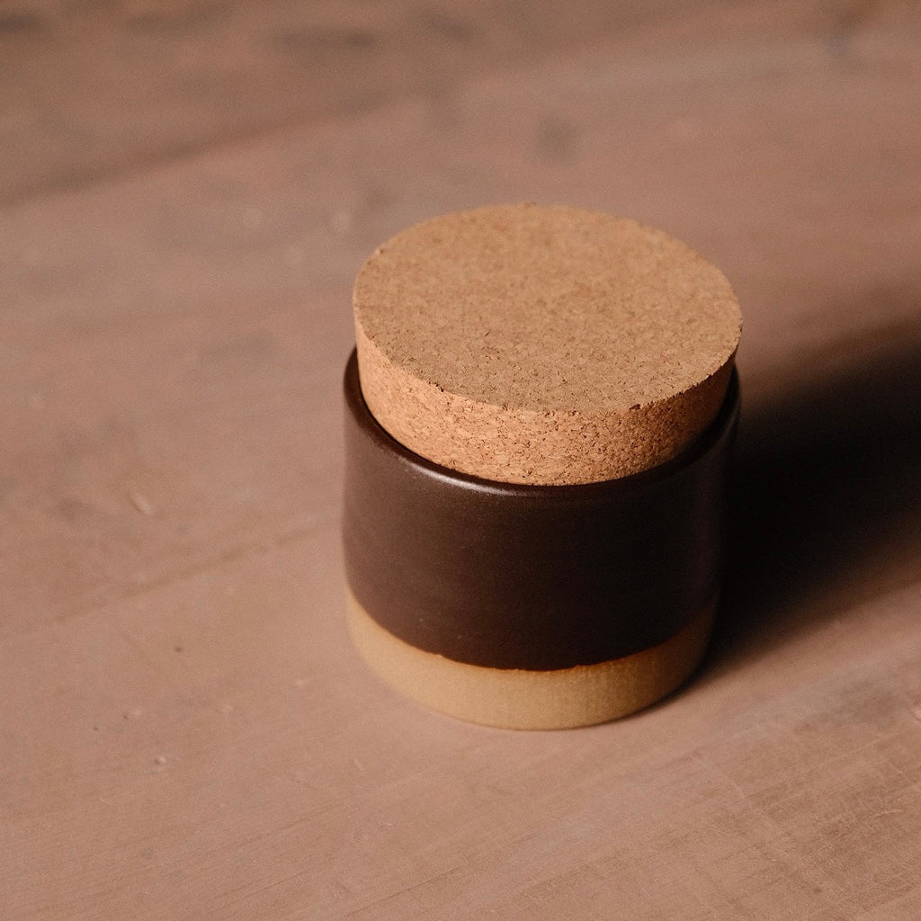 Hand-Thrown Stoneware Salt Jar with Cork Lid photographed on a bone white surface in soft natural light