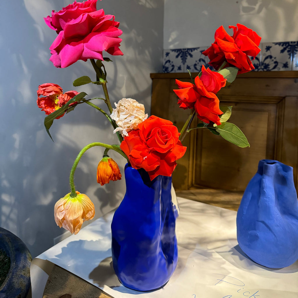 Sculpted Cobalt Blue Porcelain Vase shown from a second angle against a pale neutral backdrop
