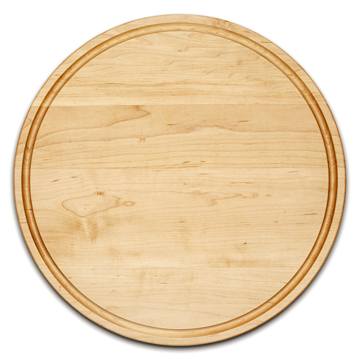 Thick round maple cutting board with a juice groove, 18 in, overhead view on white