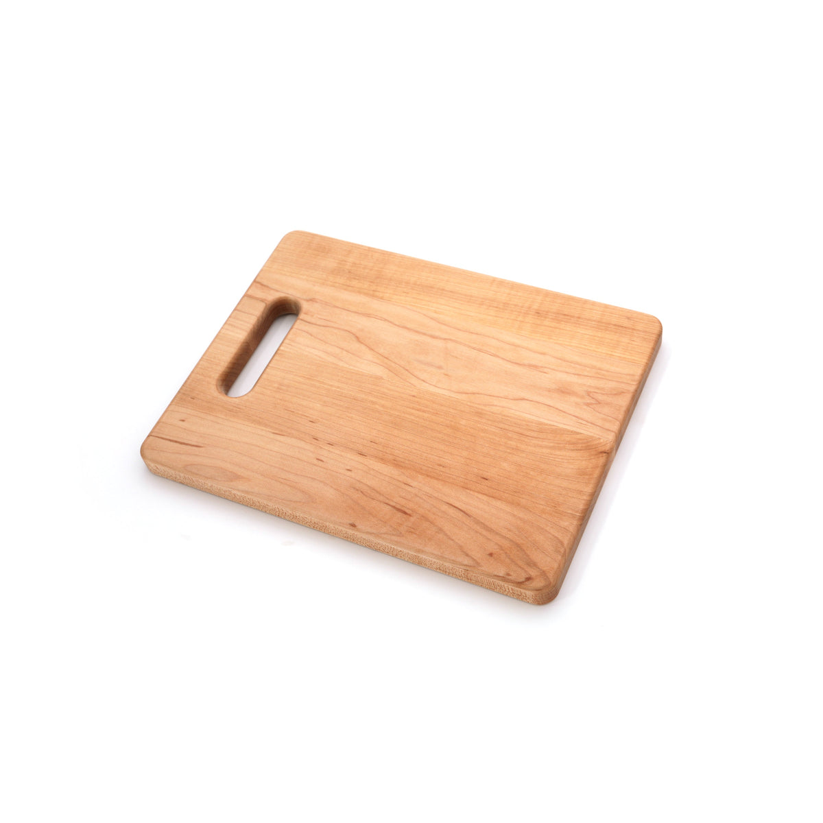 Maple single handle cutting board, 12 x 9 in, turned at an angle on white with the handle at top left