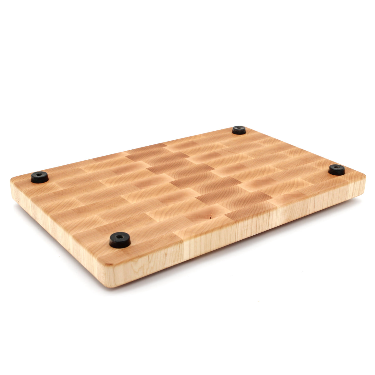 End grain maple cutting board, 18 x 12 in, angled view of the underside with rubber feet