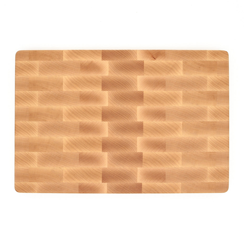 End grain maple cutting board, 18 x 12 in, straight overhead view of the brick pattern on white