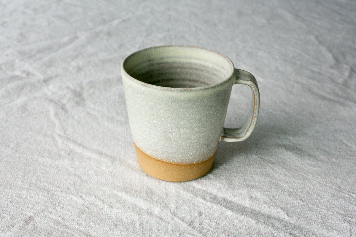 Hand-Thrown Stoneware Americano Mug photographed on a bone white surface in soft natural light