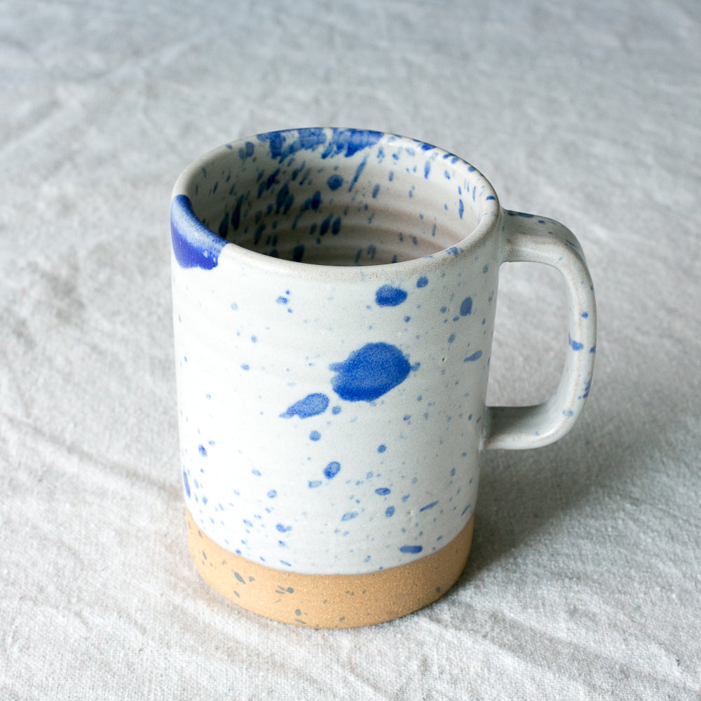 Hand-Thrown Stoneware Cappuccino Mug shown from a second angle against a pale neutral backdrop