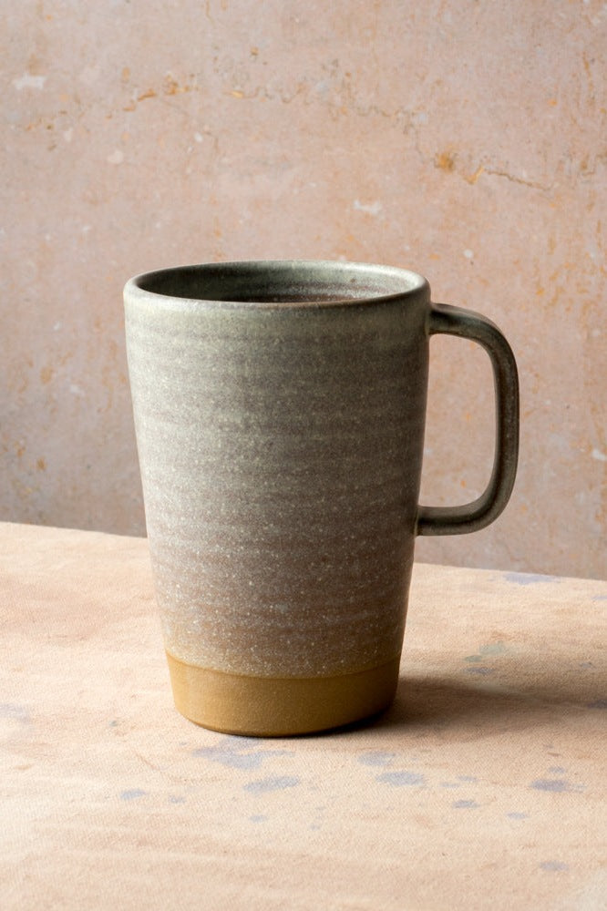 Hand-Thrown Stoneware Latte Mug photographed on a bone white surface in soft natural light