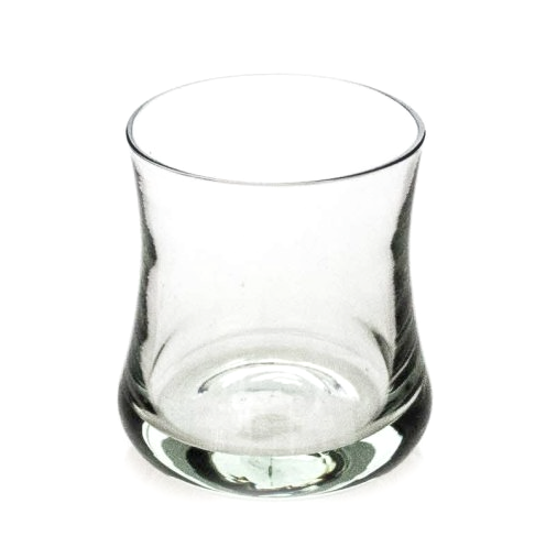 Close view of the curved recycled glass cocktail tumbler showing its heavy base and soft shape