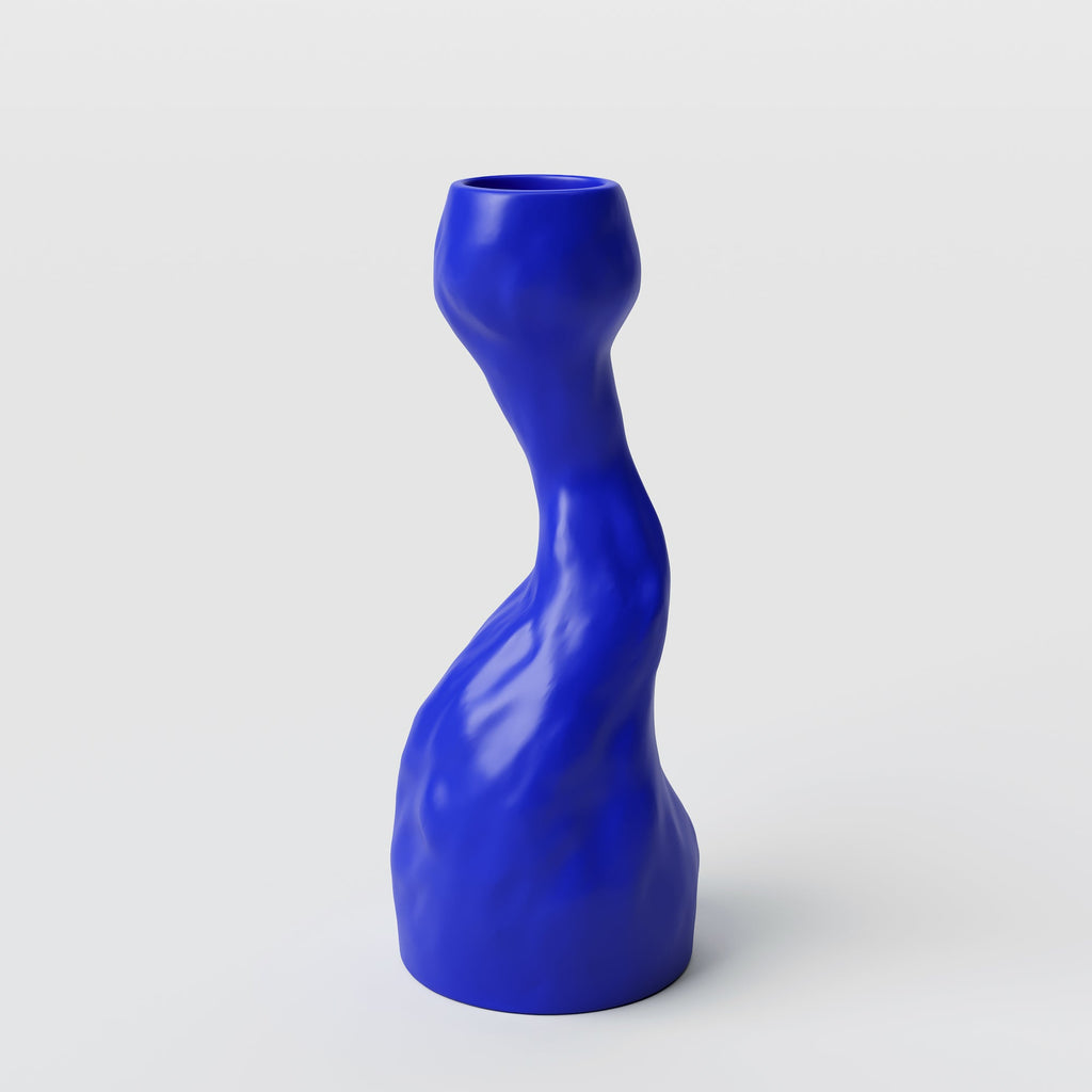 Curved Cobalt Porcelain Candle Holder photographed on a bone white surface in soft natural light