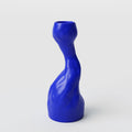 Curved Cobalt Porcelain Candle Holder photographed on a bone white surface in soft natural light