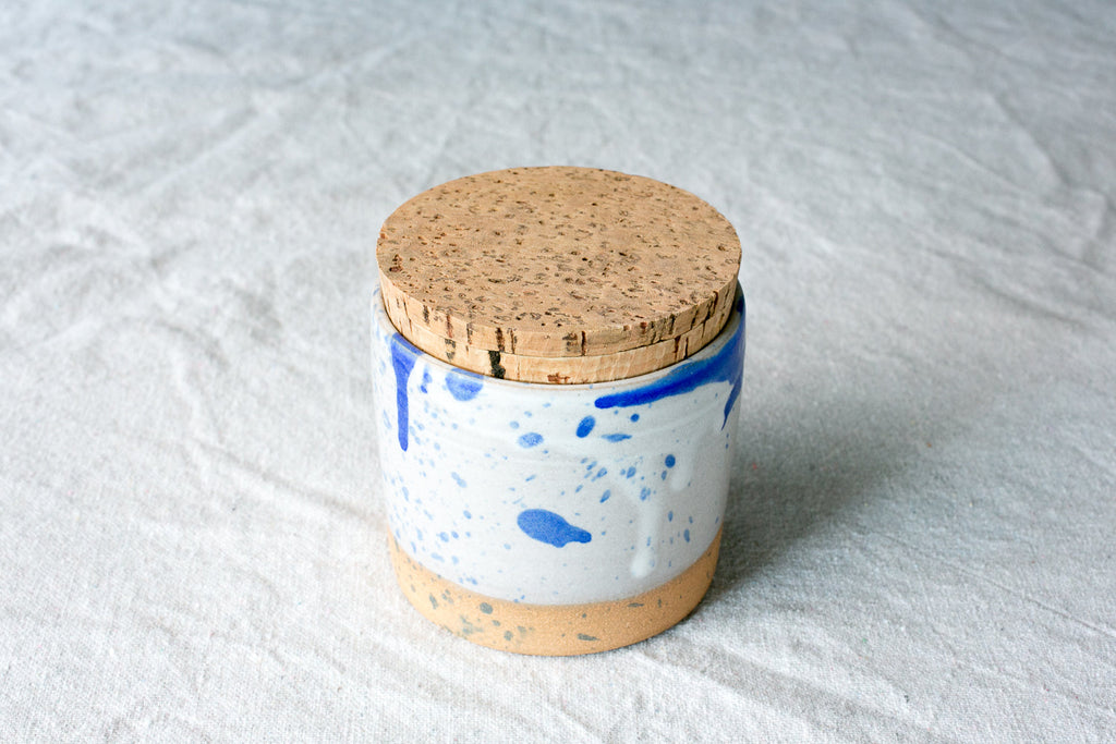 Hand-Thrown Stoneware Salt Jar with Cork Lid shown from a second angle against a pale neutral backdrop