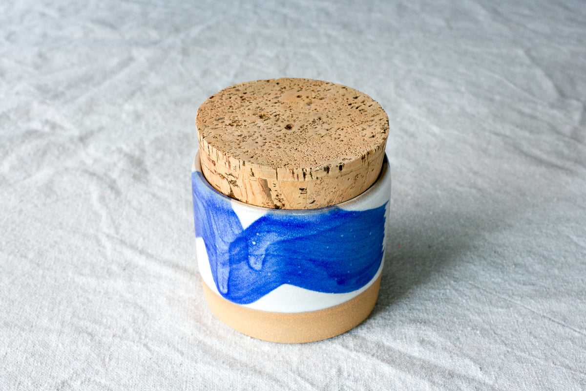 Hand-Thrown Stoneware Salt Jar with Cork Lid styled on a wood table with linen in a modern Southwest room