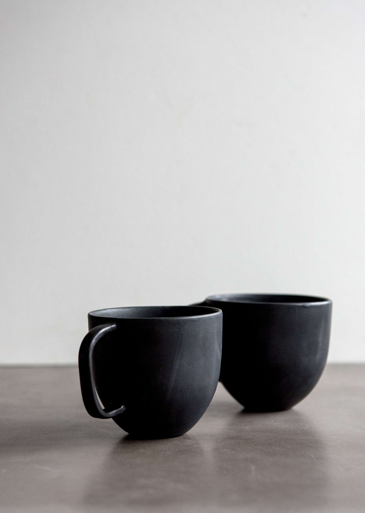 Matte Black Stoneware Mug in a detail view showing surface texture and finish up close