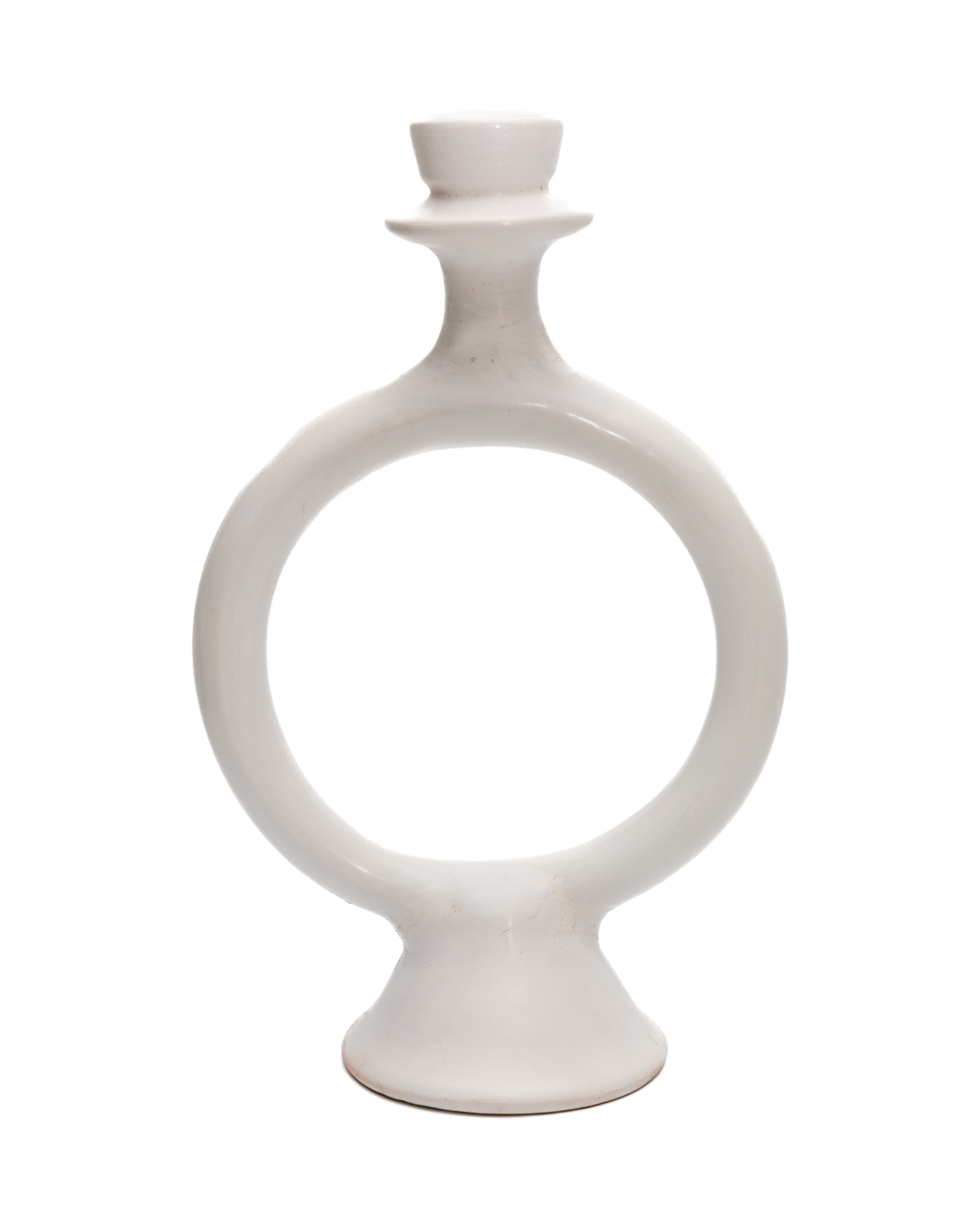 White satin glazed terracotta candle holder with an open ring shape shown on a black background
