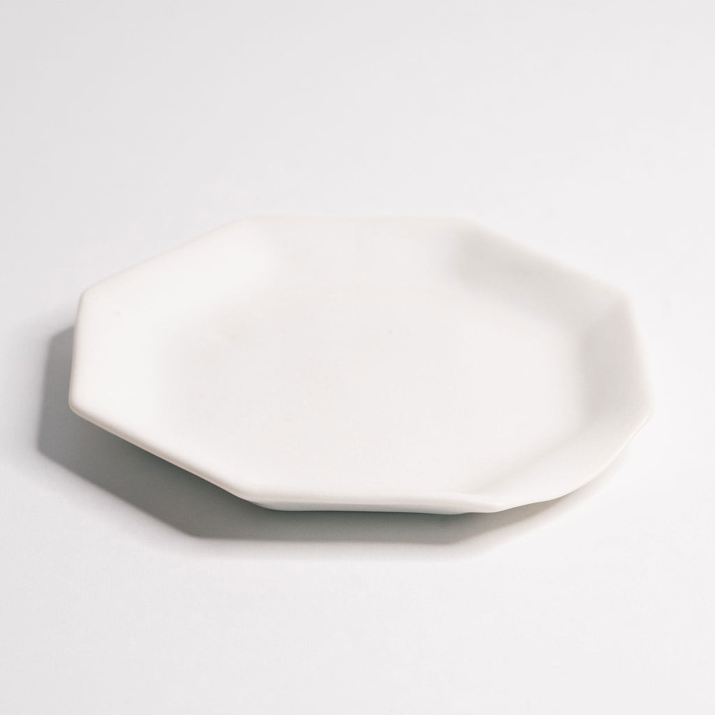 Octagonal Glazed Porcelain Spoon Rest shown beside companion pieces from the same maker's line