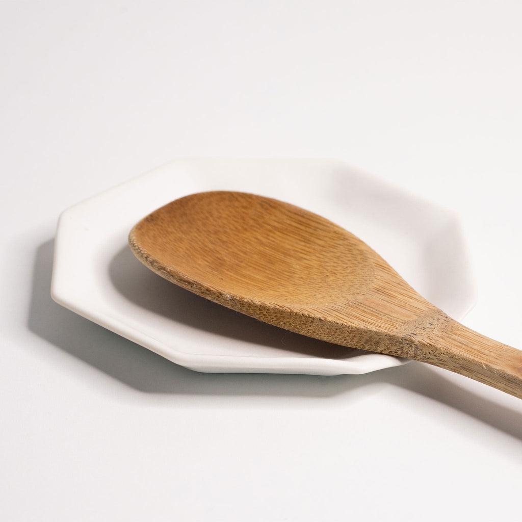 Octagonal Glazed Porcelain Spoon Rest shown from a second angle against a pale neutral backdrop