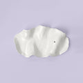 White Porcelain Incense Holder photographed on a bone white surface in soft natural light