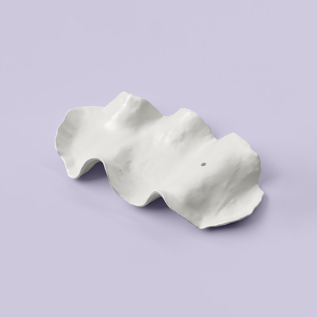 White Porcelain Incense Holder shown from a second angle against a pale neutral backdrop