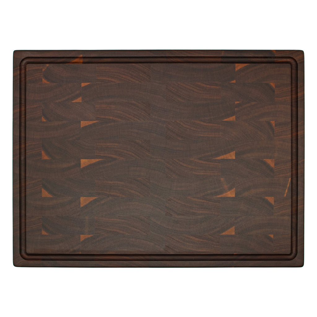 End grain walnut cutting board with a juice groove, 20 x 15 in, straight overhead view on white
