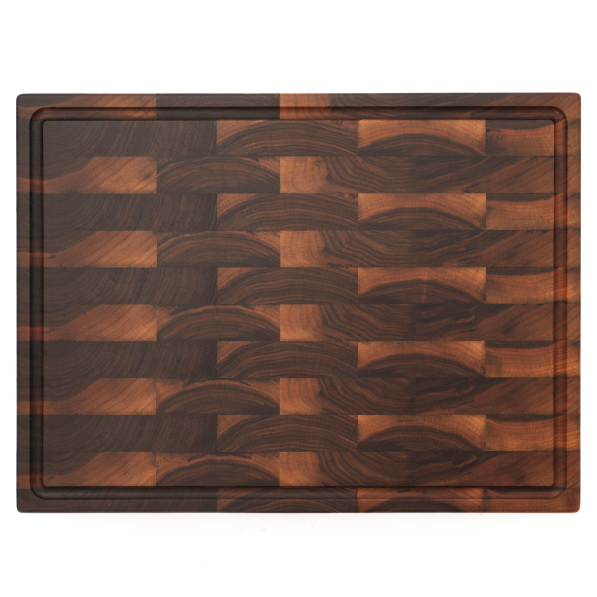 End grain walnut butcher block with a juice groove, 24 x 18 in, straight overhead view on white