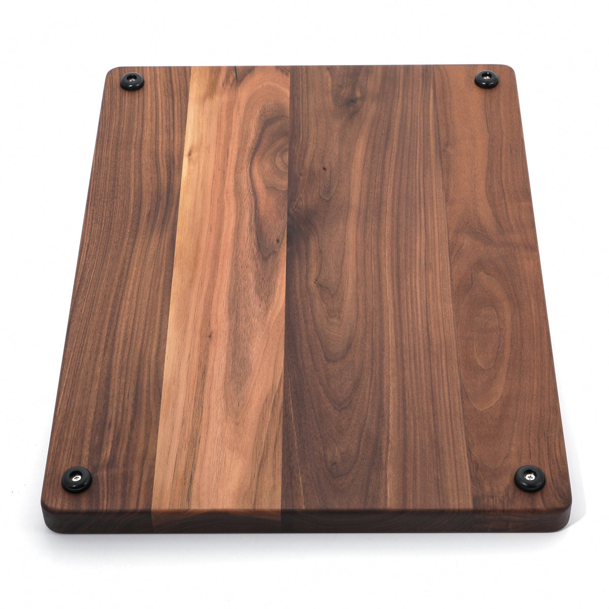 Extra large thick walnut cutting board, 24 x 18 in, angled view of the underside with a pale center plank