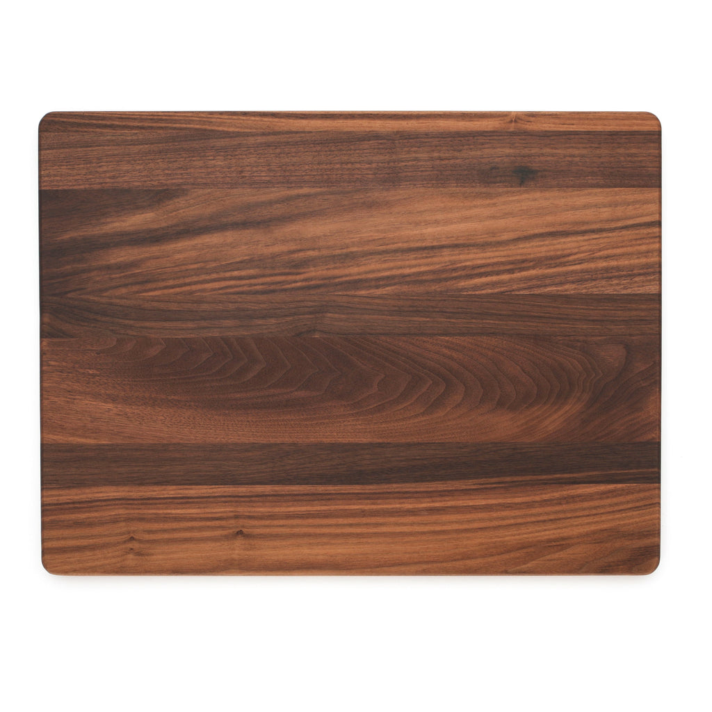 Extra large walnut cutting board, 24 x 18 in, overhead view of the plain back face with warm grain