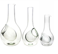 Three recycled glass wine decanters with built-in ice pockets, shown in small, medium and large sizes