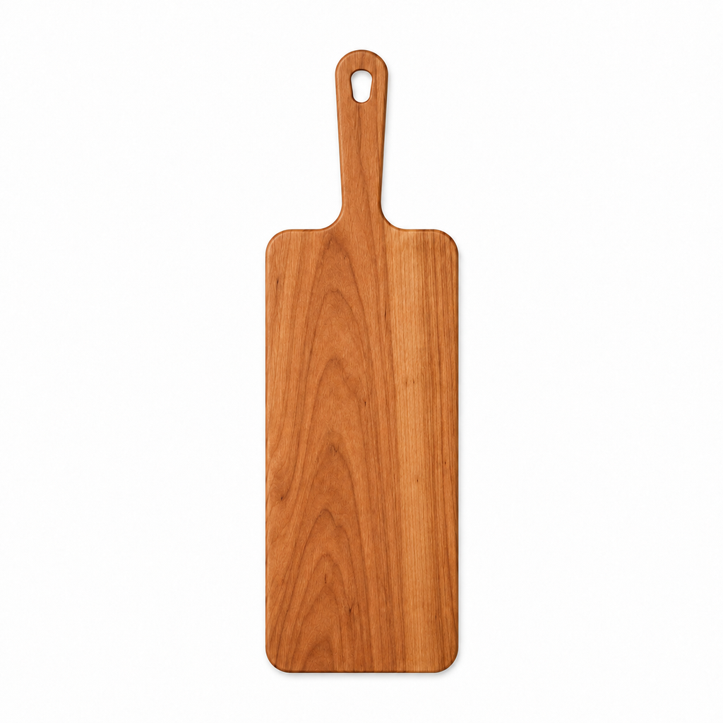Narrow cherry paddle serving board with a handle and hanging hole, 18 in, overhead view on white