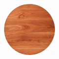 Thick round cherry cutting board, 18 in, plain top with no groove, overhead view on white