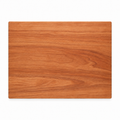 Thick flat grain cutting board in cherry, 20 x 15 in, plain top, overhead view on white