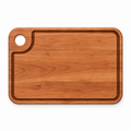 Cherry cutting board with a corner thumb hole and juice groove, 18 x 12 in, overhead view on white