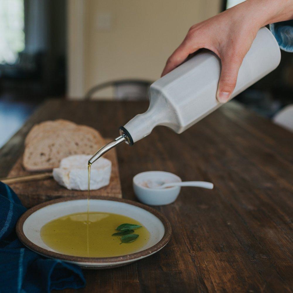 Porcelain Olive Oil Dispenser in a detail view showing surface texture and finish up close