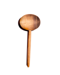 Single carved walnut oval serving spoon with warm honey-colored grain, shown from above against black
