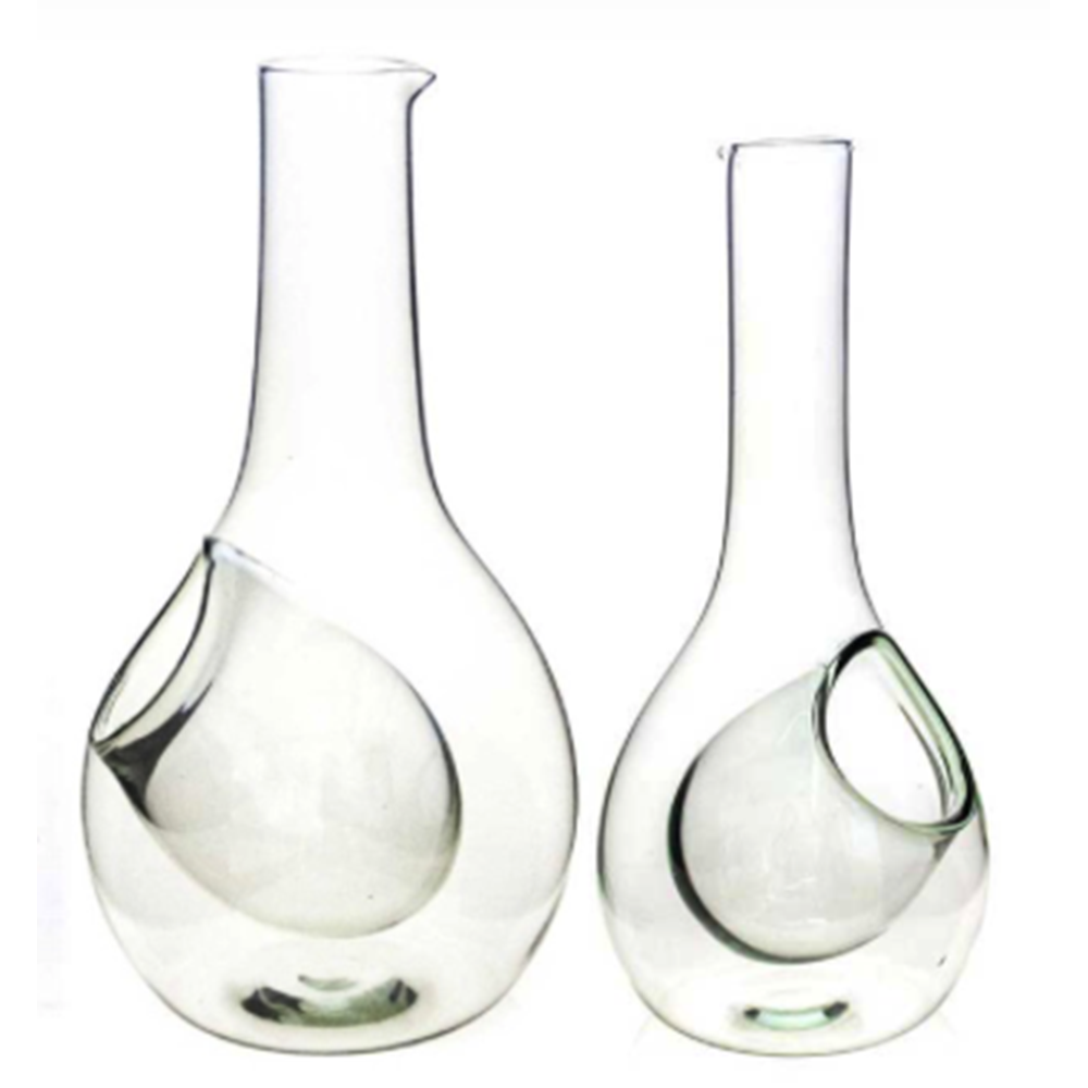 Two recycled glass wine decanters of different heights with ice chambers on a white background