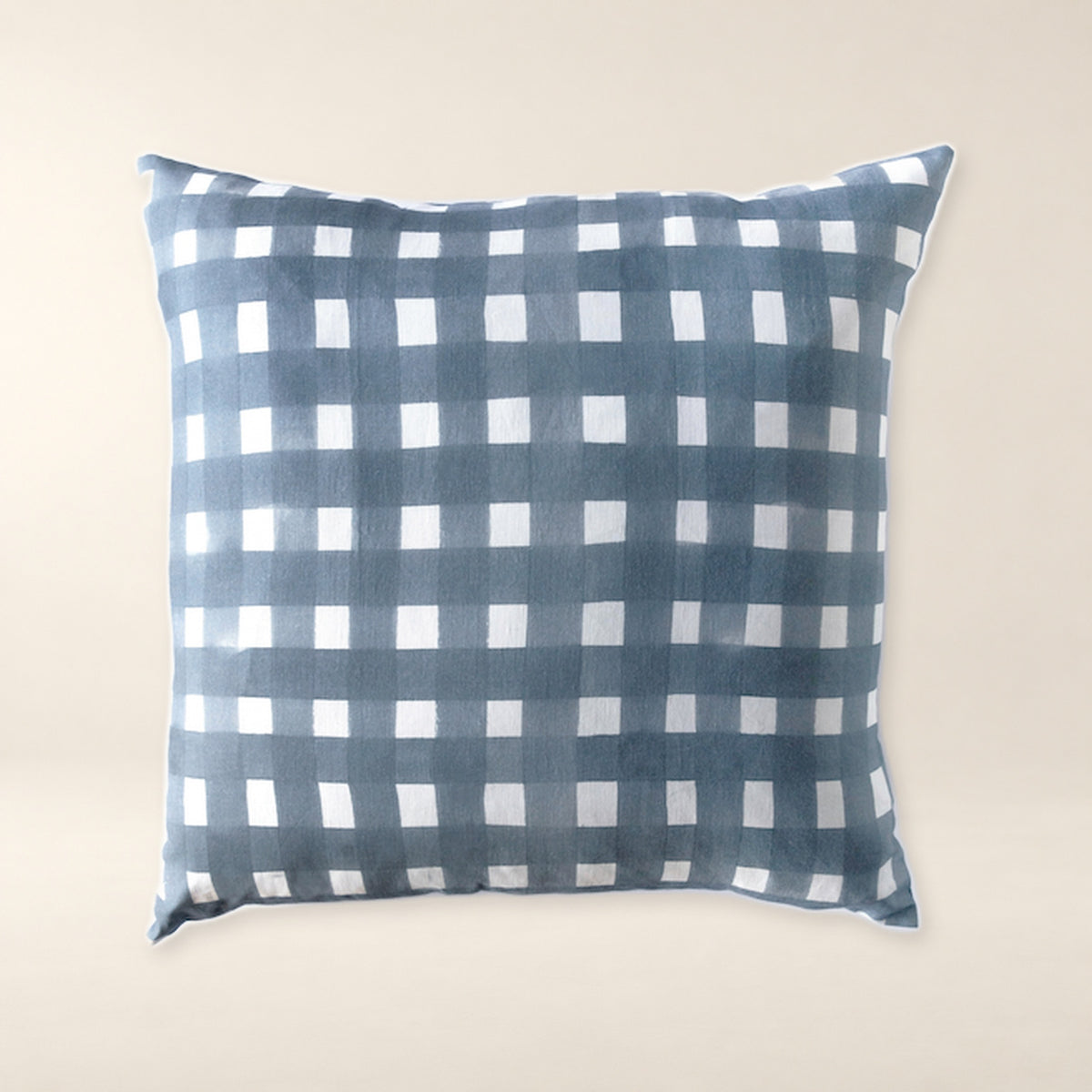 Blue Cross-Hatch Linen Throw Pillow on a warm bone background.