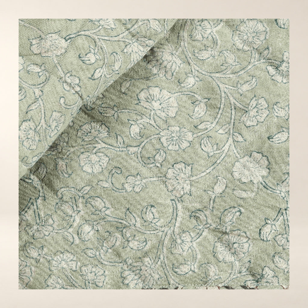 Keya Linen Block Print Quilted Coverlet tighter close-up of the photographed surface.