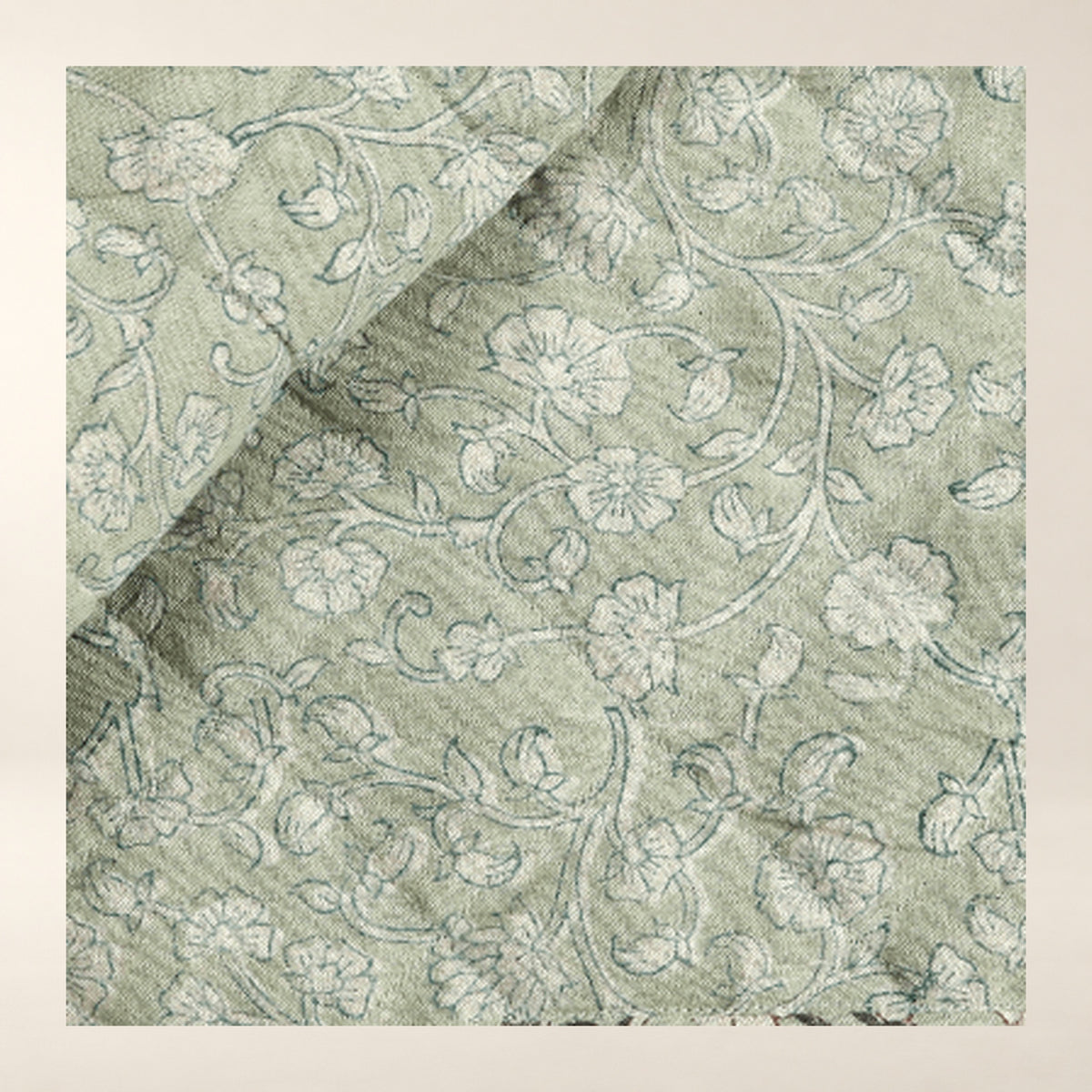 Keya Linen Block Print Quilted Coverlet tighter close-up of the photographed surface.