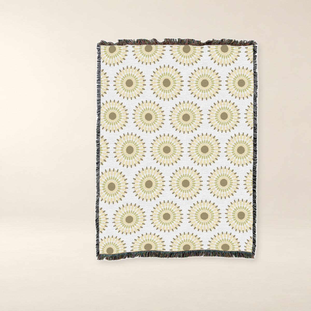 Sand Sunburst Woven Cotton Throw on a warm bone background.